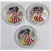 Image 1 : THREE COLORIZED AMERICAN SILVER EAGLES