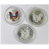 Image 2 : THREE COLORIZED AMERICAN SILVER EAGLES