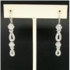 Image 1 : 14k White Gold & Diamond Long Dangle EarringsPave Ribbons & Flower Clusters