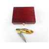 Image 1 : DECORATIVE WOLF FOLDING KNIFE IN CASE