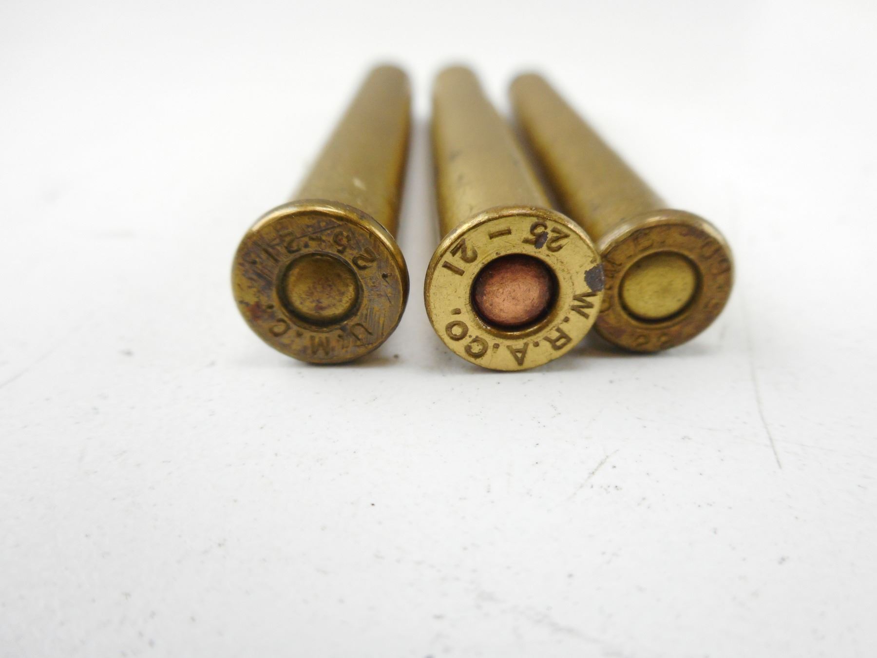 25 21 ASSORTED AMMO BRASS CASE