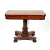 Image 1 : Victorian mahogany card table with folding swivel top and green baize lined interior on a carved ped