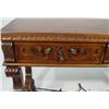Image 2 : Heavily carved walnut hall table fitted two short drawers on scrolled supports with carved claw feet