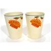 Image 1 : Pair of Clarice Cliff design honeyglaze pottery beakers, painted with flowers, printed factory marks