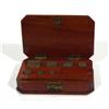 Image 1 : Late 19th Century mahogany cased set of brass weights, 10cm in length 