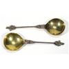 Image 1 : Pair of brass commemorative spoons with figural decoration and twisted stems, each 19cm long