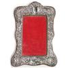 Image 1 : Rectangular silver photo framed with embossed leaf and floral decoration, Chester 1915, 20cm high