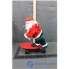Image 2 : Skateboard Santa