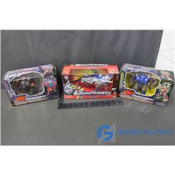 (3) Transformers Toys