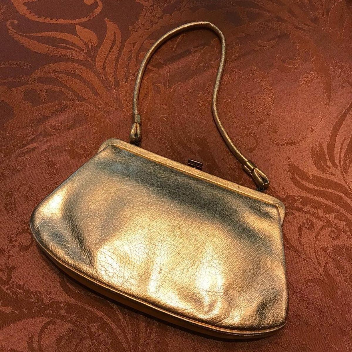 gold lame pocketbook