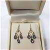 Image 2 : 18K TANZANITE (6.2CT) DIAMOND (0.07CT) EARRINGS