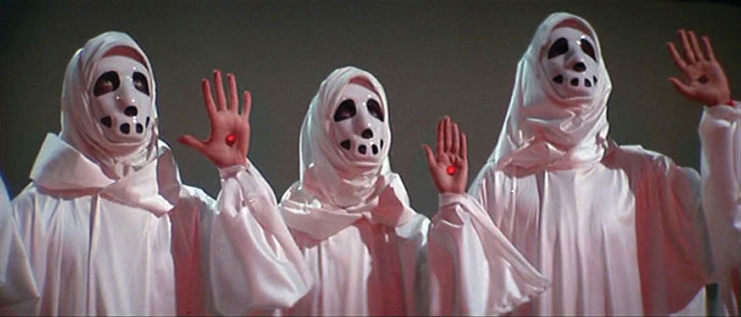 Carousel women's ceremonial robe and mask from Logan's Run.