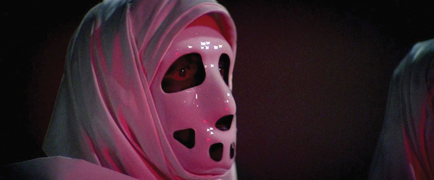 Carousel women's ceremonial robe and mask from Logan's Run.