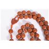 Image 3 : A carved wooden rosary.