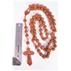 Image 6 : A carved wooden rosary.