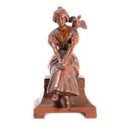 Cast bronze maiden.