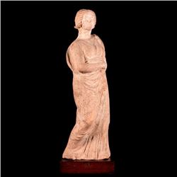 An ancient Roman terracotta figure.