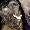 Image 2 : BAG OF TOUR ROLLER SKATES AND 2 SETS HOCKEY LEG PADS