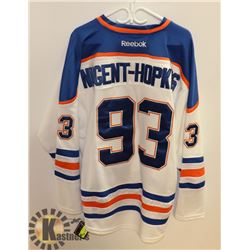 REEBOK OILERS NUGENT HOPKINS SIZE 54 JERSEY.