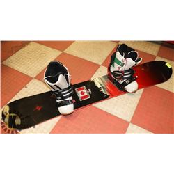 SNOWBOARD WITH BINDINGS WITH SNOWBOARD BOOTS.