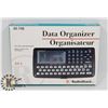 Image 1 : NEW RADIO SHACK 64K DATA ORGANIZER