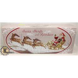 SANTA & REINDEER ORNAMENTAL FIGURE.