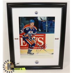 AUTOGRAPHED PICTURE OF ESA TIKKANEN-GAA ON BACK.