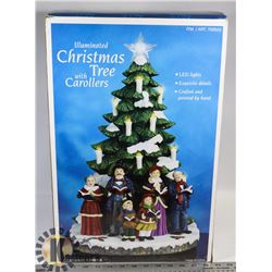ILLUMINATED CHRISTMAS TREE WITH CARROLLERS