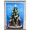 Image 1 : ILLUMINATED CHRISTMAS TREE WITH CARROLLERS