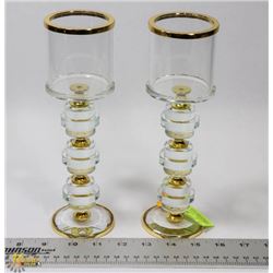 PAIR OF CRYSTAL GOLD TONED CANDLE HOLDERS.
