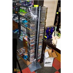 CD RACK FILLED WITH COUNTRY CD'S SOME NEW