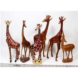 BOX OF WOOD CARVED ANIMAL ORNAMENTS