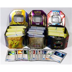 3 POKEMON TRADING CARD GAME TINS FILLED.