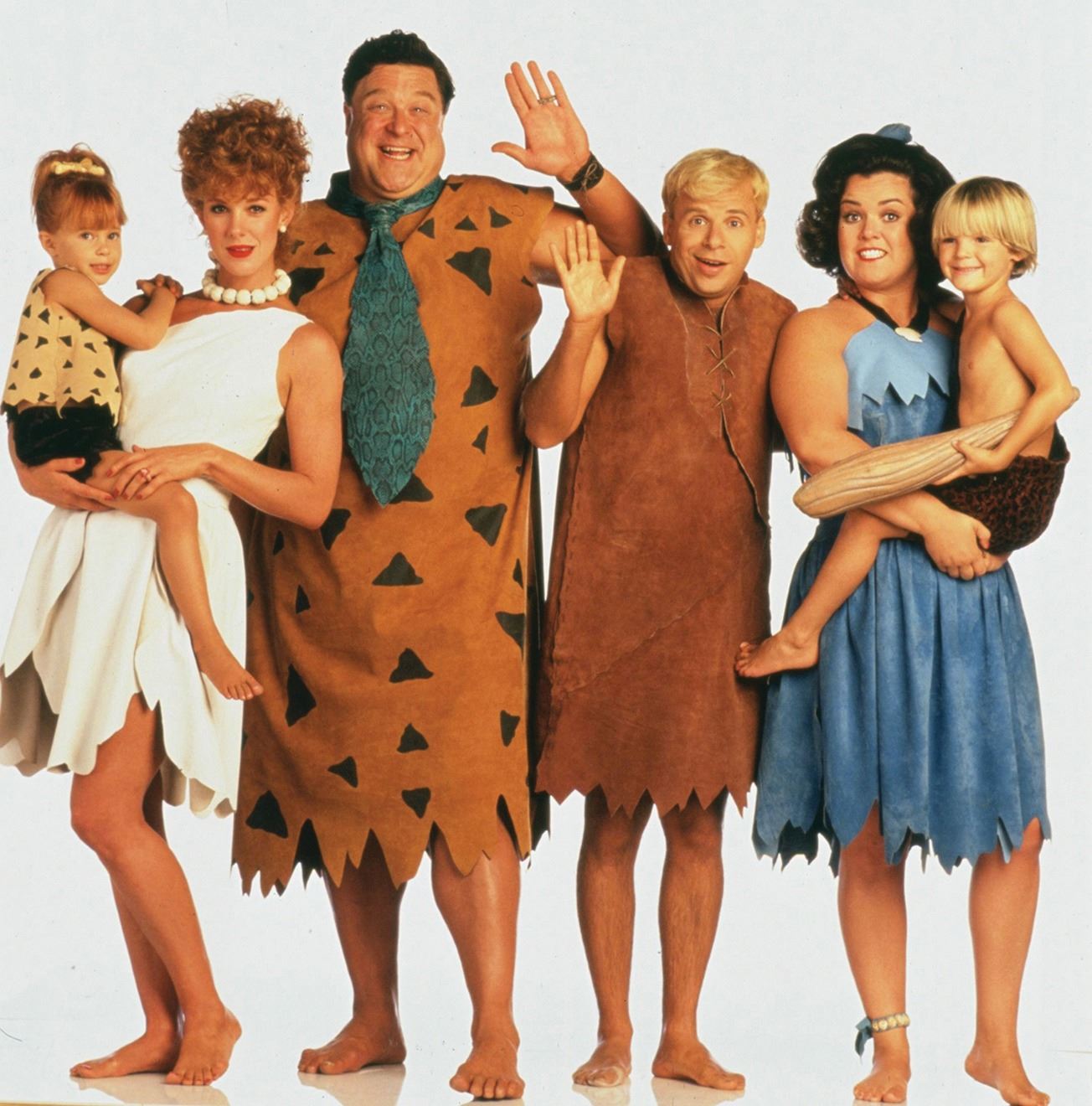 John Goodman Fred Flintstone And Rick Moranis Barney Rubble Costumes From The Flintstones
