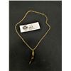 Image 1 : Tiger Tooth Style Pendant on a Gold Plated Chain