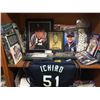 Image 1 : Nice Big Shelf Lot of Seattle Mariners Memorabilia, Pictures, Stuffies, books, Autographs Plus much 