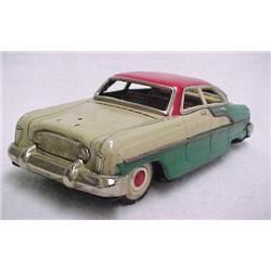 Tin friction car; white red & green with detailed