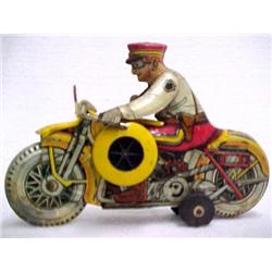 Motorcycle Policeman; pressed tin wind-up toy; in