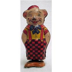 Pig with Red Cap; tin wind-up toy; J. Chein & Co.