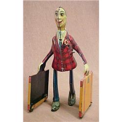 Man with Suitcases; tin wind-up toy; no maker's m