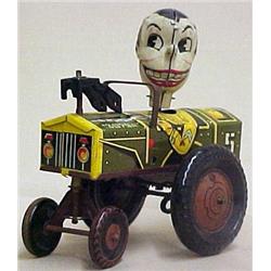 Jolly Joe machine gunner in army car; tin wind-up