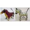 Image 1 : Two tin wind-ups; Ferdinand the Bull; and Zebra w