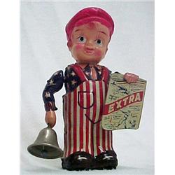 Newsboy; tin wind-up toy with celluloid head; Mad