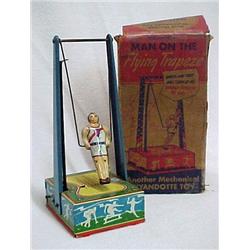 Mechanical Man on the Flying Trapeze; tin wind-up