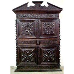 Dutch walnut kas; carved scroll and bird on pedim