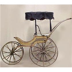 Victorian baby carriage; canvas awning over woode