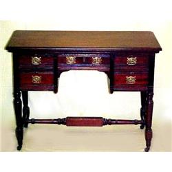 Walnut Victorian desk; rectangular top with chamf