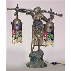 Spelter figural lamp; washer woman; with two jewe