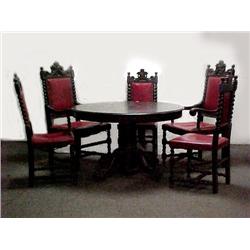 Oak table and six chairs; early 20th C. round ped