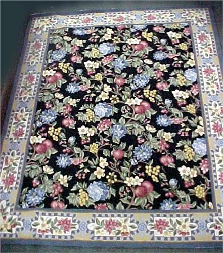 Hand made petit-point hooked rug with floral desi
